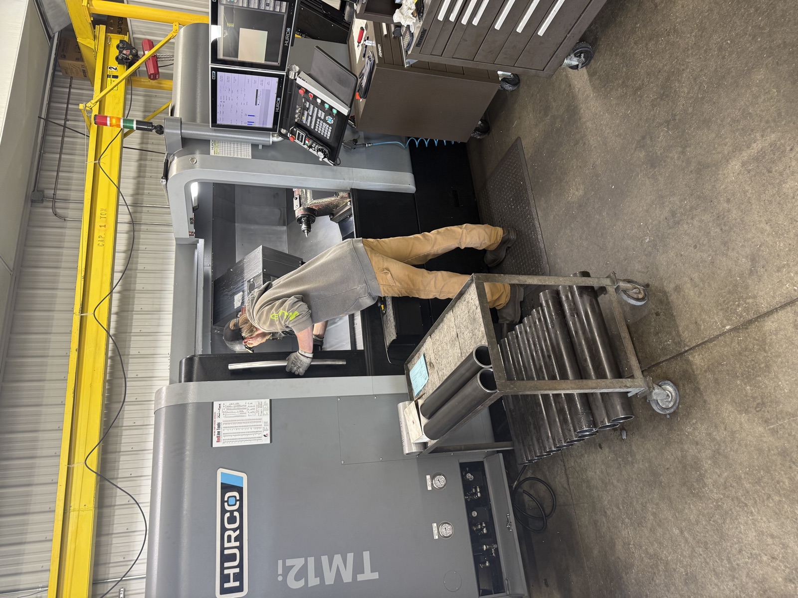 A ProTech machinist setting up a part in the Hurco TM12i CNC turning center